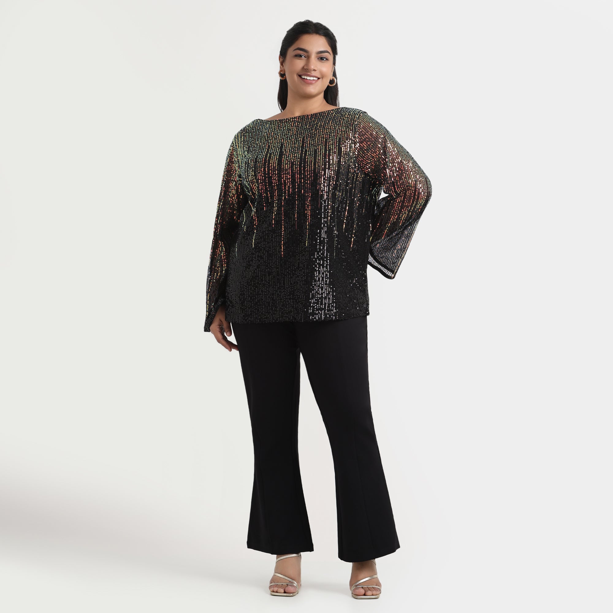 Gold plissé top with a luxurious shimmer, tailored for an elegant look.