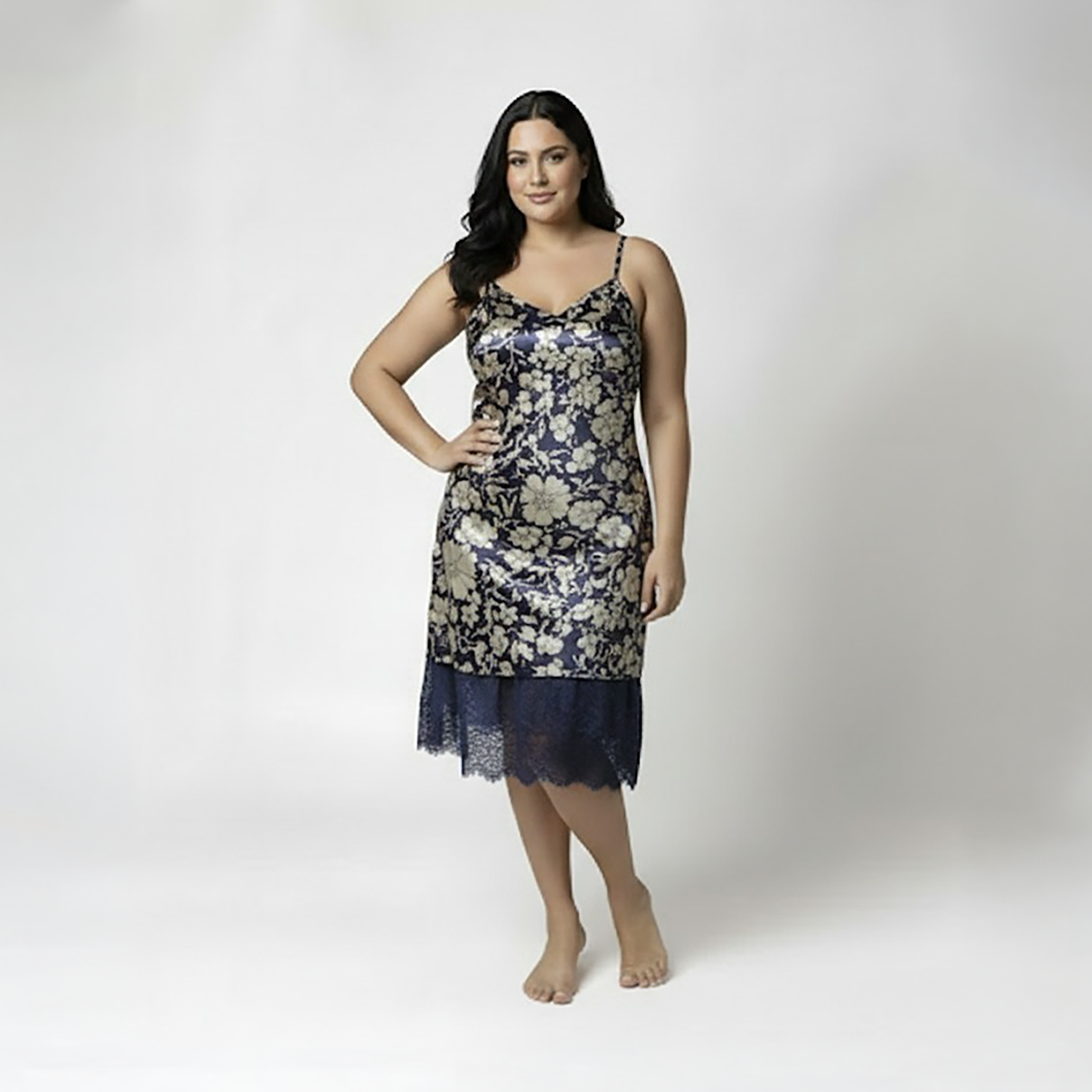 Woman wearing a floral nightgown on a white background