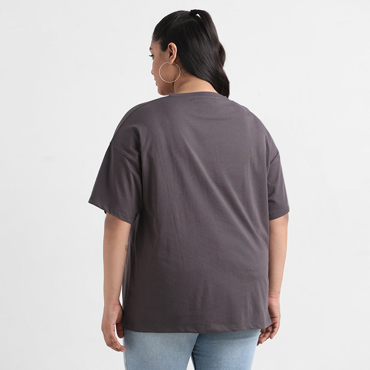 Plus size textured top with modern design back view, Calae plus size clothing
