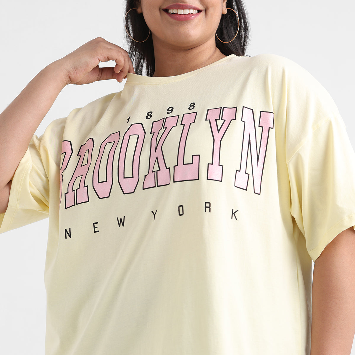 Delicate printed tshirt with a soft color palette, designed for plus sizes.

