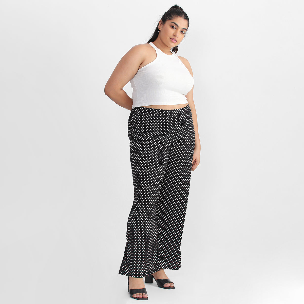 Black Polka Dot Print Plus Size Textured Palazzos by Calae Sizes