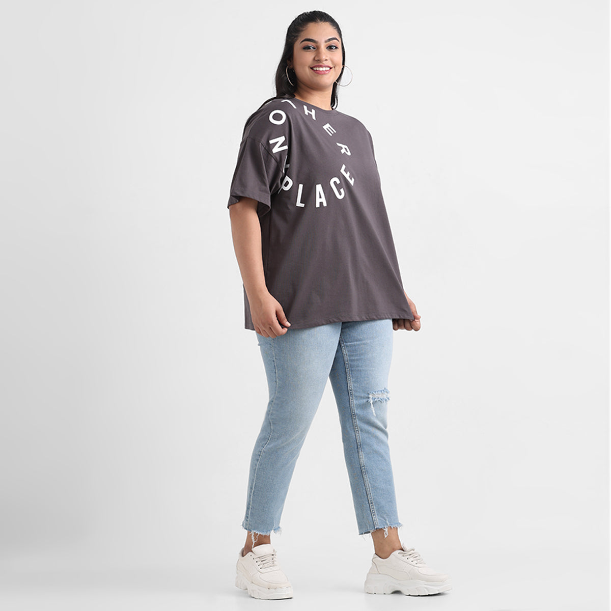 Plus size textured top with modern design
