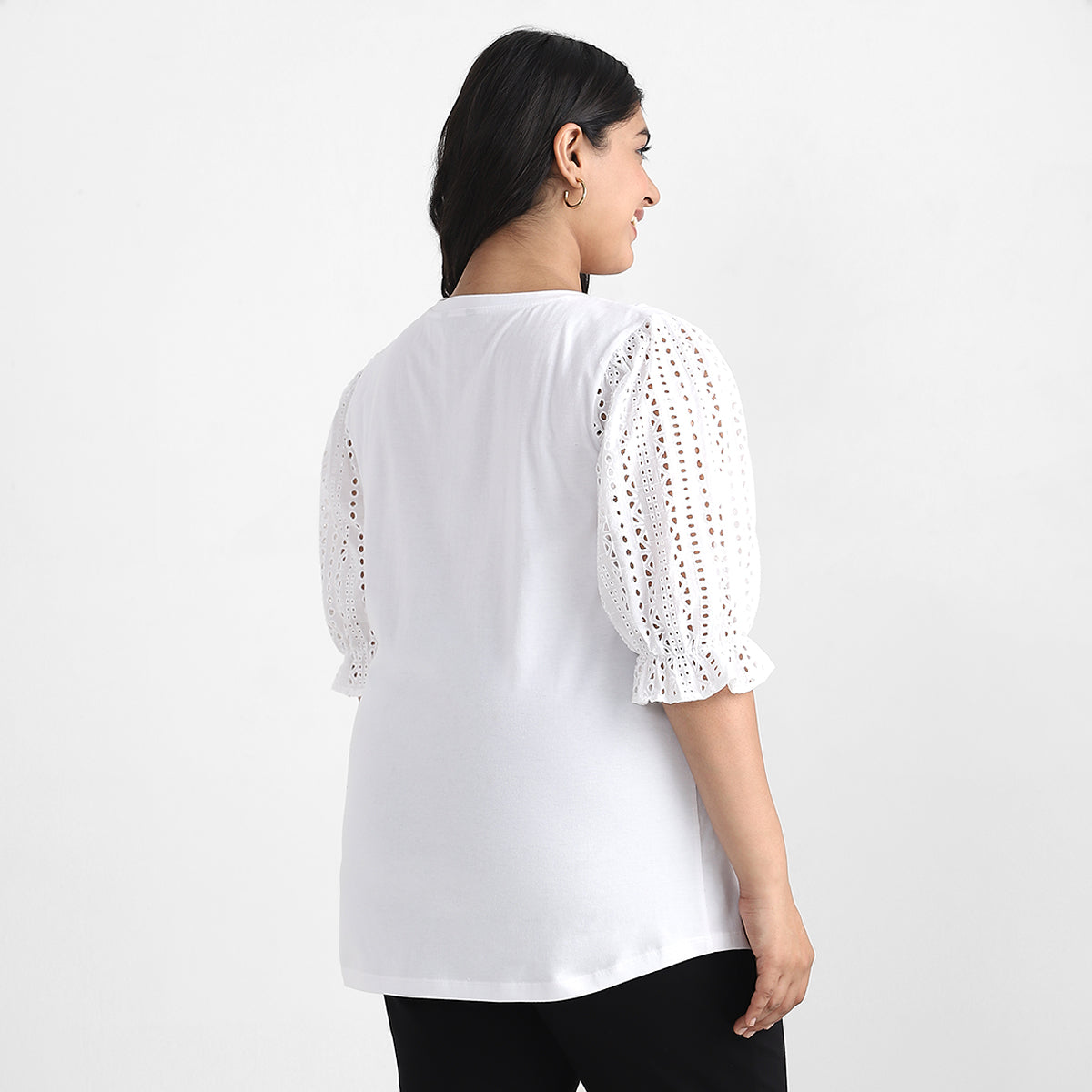 Image showcasing Backside of women wearing White Puff Sleeve