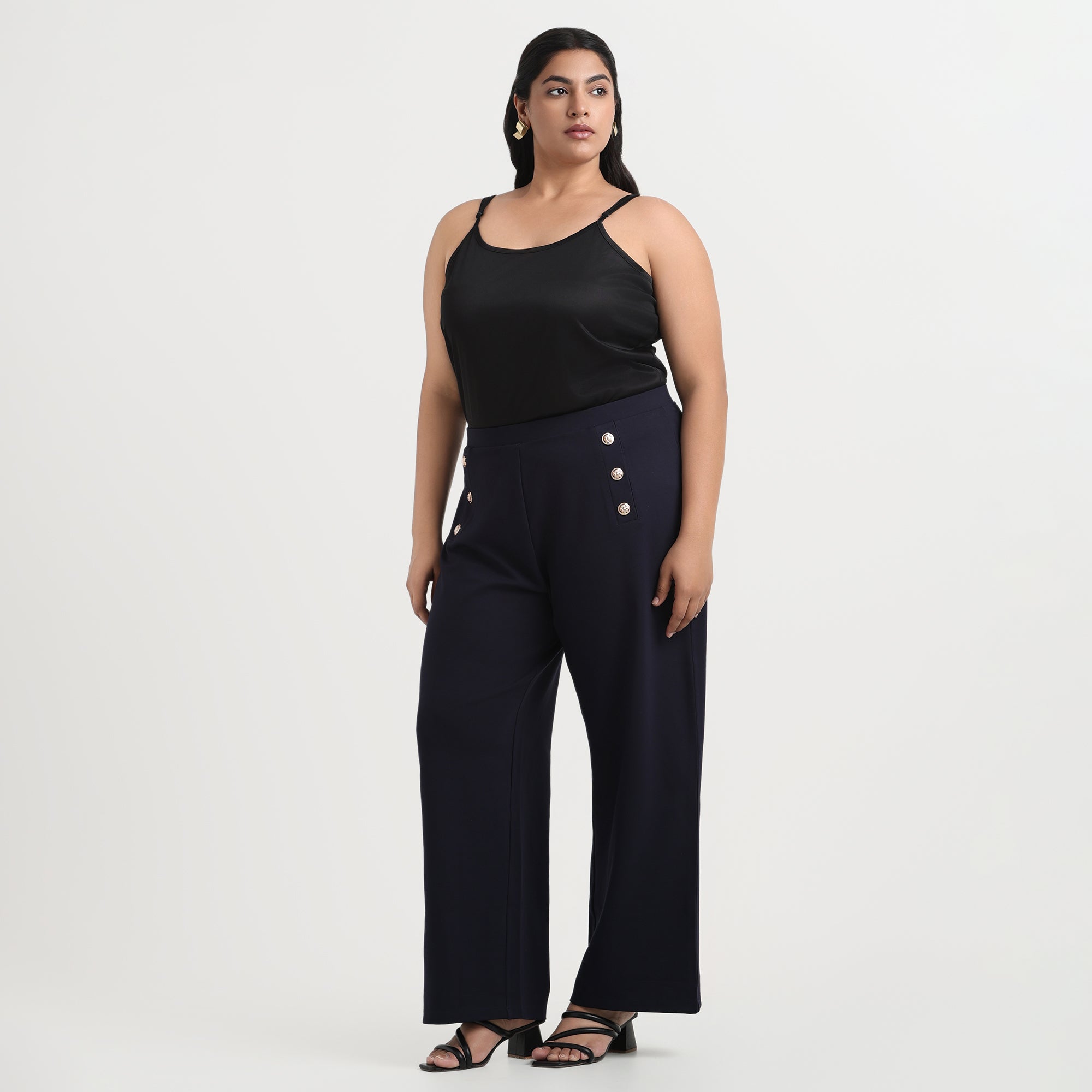 Navy flared pants with button detail, stylish plus size fit
