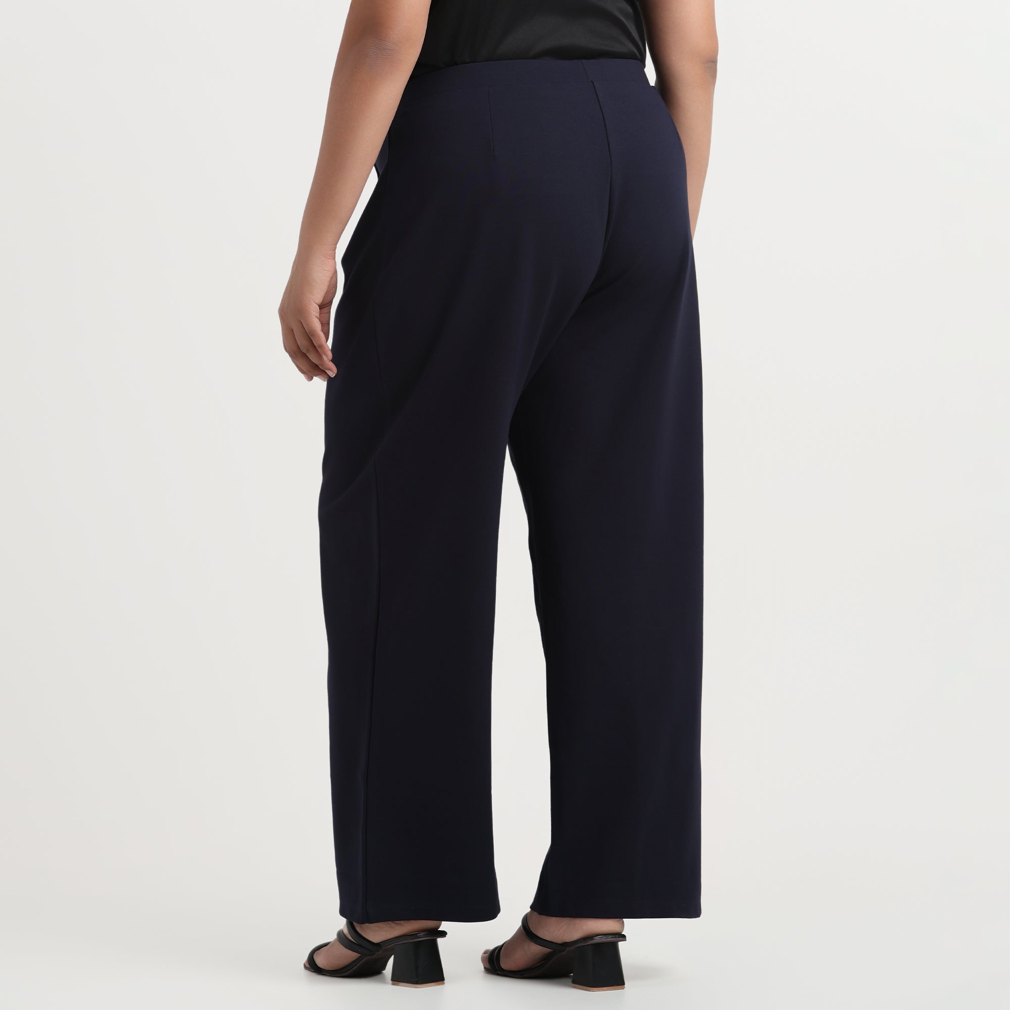 Navy blue flared pants with button detail, plus-size
