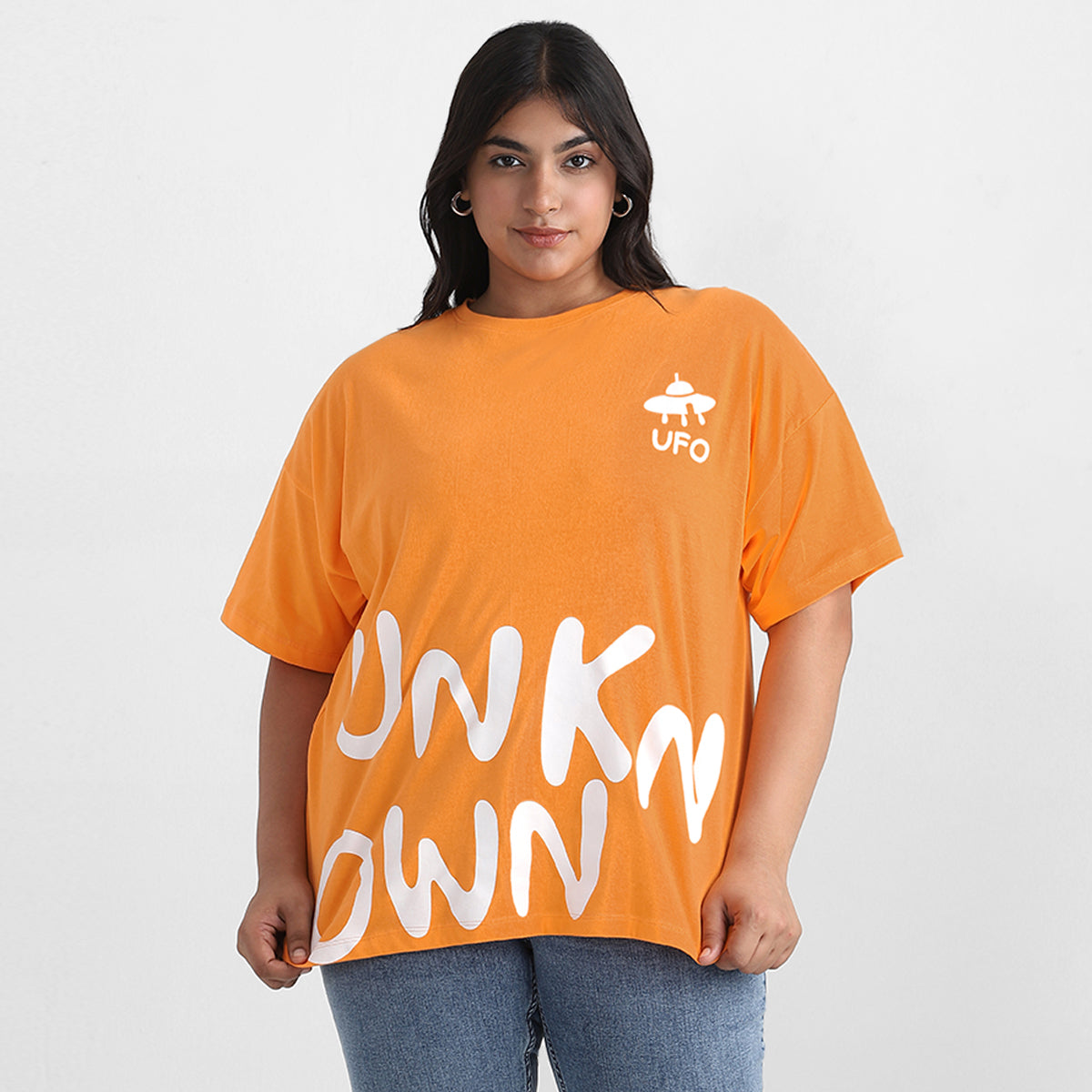 Plus size textured orange top with modern design, Calae plus size clothing
