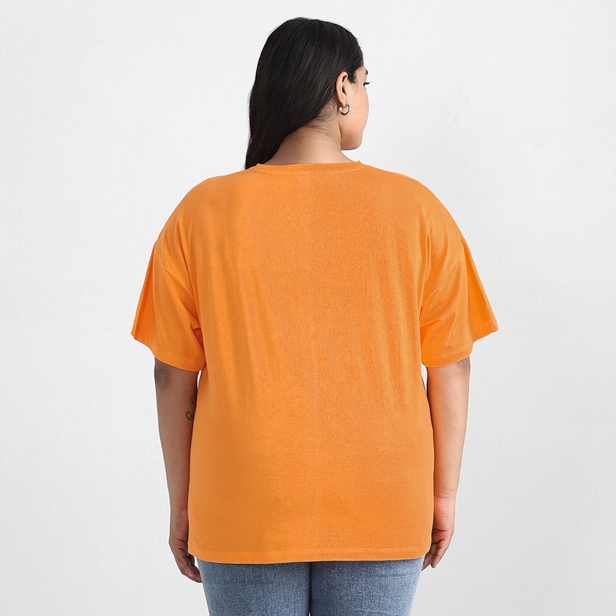 Pastel tshirt with a vibrant color palette, drop shoulders, and plus-size fit.
