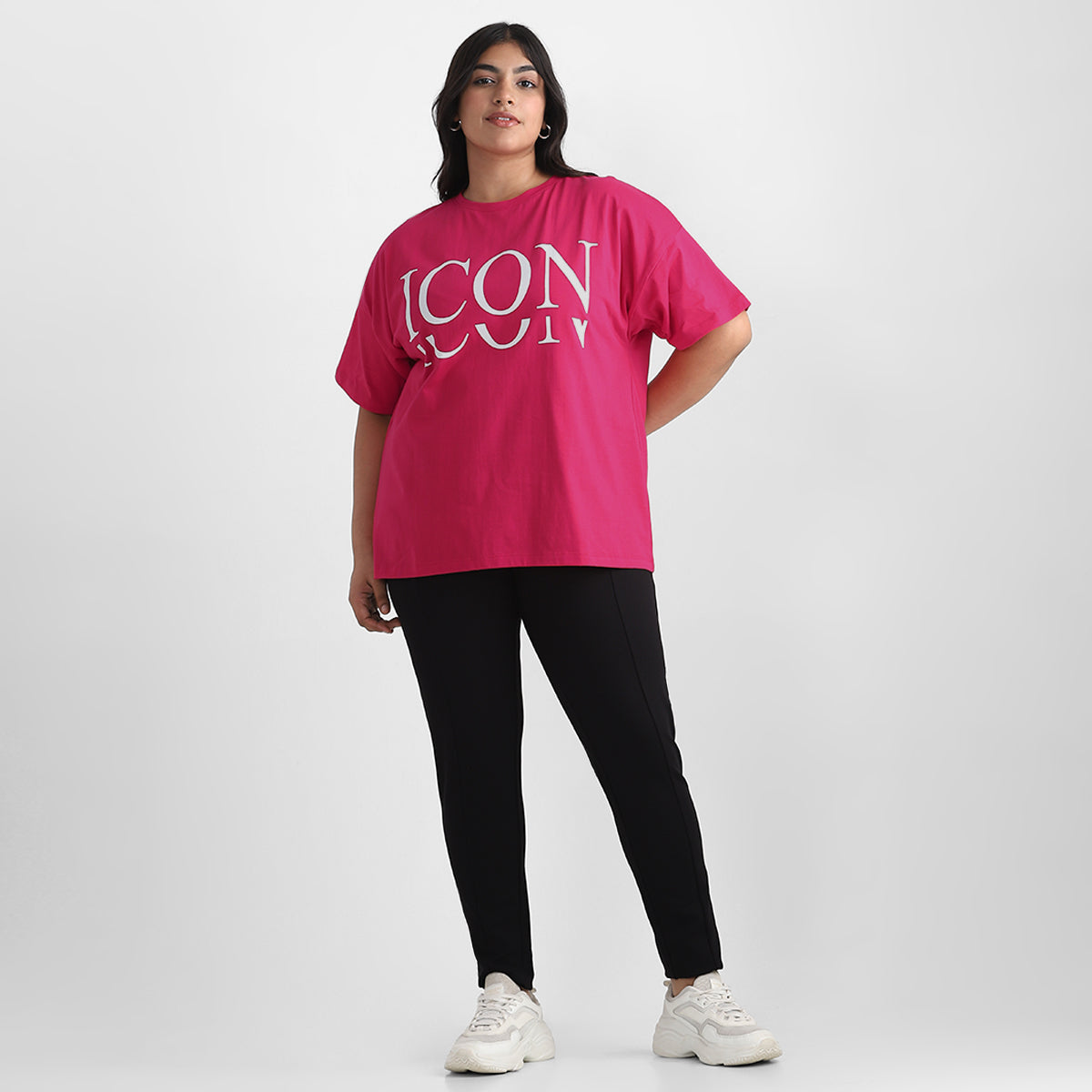 Image showcasing a woman wearing pink t-shirt