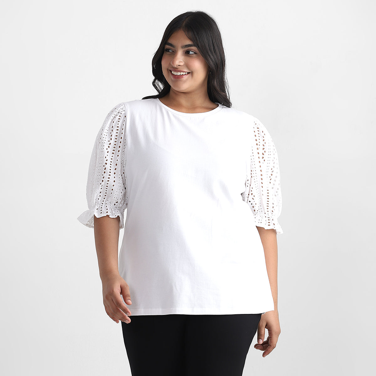 Image showcasing women wearing top with half sleeves